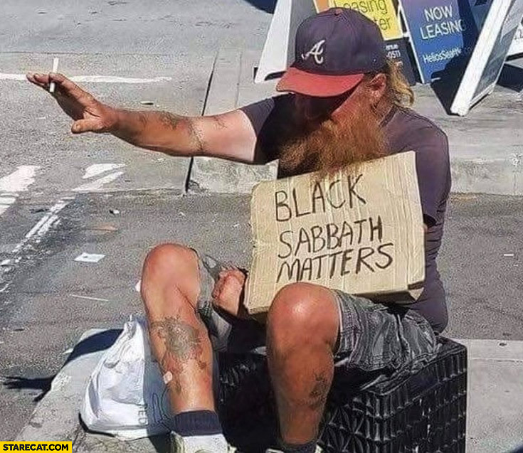 black-sabbath-matters-guy-with-a-sign.jpg